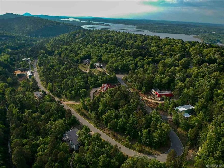 Beautiful, quiet area! This lot has creek access, and a great view of gorgeous sunsets! Wonderful neighborhood in the middle of town, yet feels like you are in the woods, thanks to green belt restrictions.