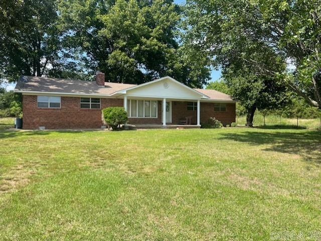 Peaceful country setting. Spacious all brick ranch style home with acreage. This 60 year old home is in good condition and ready for your updates! Majority of the flooring has been updated already. 3 BR 2 BA, spacious eat in kitchen and great room, mud room, and a "FLEX" room. SO many possibilities with this flex room since it has separate entry to the outside. Game room, man cave, craft room, home office, small business, teen room, inlaws ????? Home is being sold with approx 4.7 ACRES. Existing survey available. Existing pole barn and fencing in place but would need some attention. Home is priced and sold AS IS condition. AGENTS see remarks.