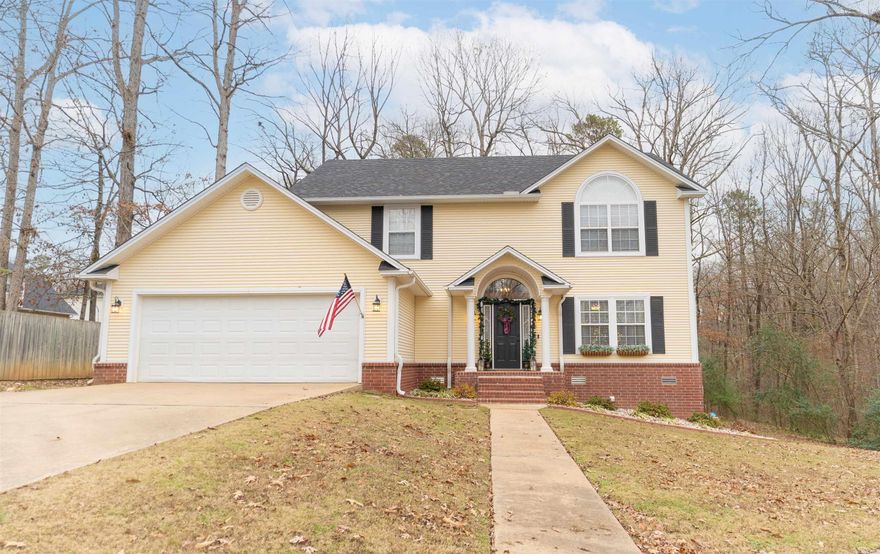 Welcome to 4122 Redfort Court in Benton, Arkansas. This home sits in a cul-de-sac in the beautifully well kept Hartford Hills subdivision of highway 5. This neighborhood sports a walking trail, as well as, a park and playground.   This 3 bed, 2.5 bath home is 2,080 square foot and boasts 1.6 acres. New roof in 2022 and new HVAC in 2022.  With updated flooring and granite throughout, the immaculate kitchen has a wonderful bar area and spacious dining area.  Downstairs you have an elegant living room with a gas fireplace. With a nicely sized laundry room with plenty of storage space, you also have a bonus room for a playroom/office/gameroom and half bath.  Upstairs you have the primary with 2 walk in closets, with a primary bathroom that has a newly tiled shower and separate bathtub.  The other two bedrooms are on the other side of the home split by a the guest bath. In between, you have a commodious space that can be used as an extra living area for family time.   With a newly built large deck outside, you have the luxury of watching deer come up to your back yard and graze while drinking coffee for your morning quiet time.   The possibilities here are endless.