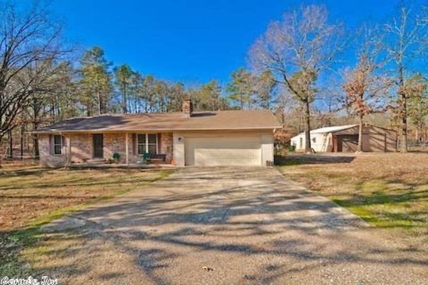 Well maintained 3BR/2BA brick home situated on aproximately 2 acres.  30X60 workshop with concrete floors and electricity and storm cellar. Well for watering your garden.  Fully fenced with new electric  gate.  New roof 2013. This house is eligible for USDA loan with 0 down.