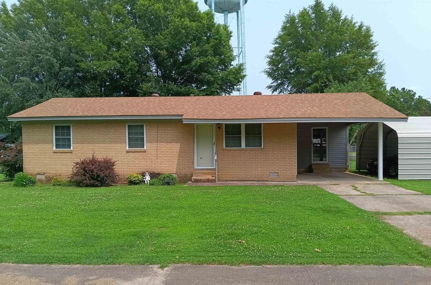 Nice 3 bedroom, 1 bath brick house with 2020 Trane central HVAC, 2022 water heater, 2018 roof located in Griffithville. There is a city park adjoining the property & it is a corner lot. The stove, water heater, heat & wall furnace are all natural gas. Refrigerator, washer & dryer will stay. There is a 2-car carport on Hamilton in addition to the single carport attached to the house. Fenced in back yard with storage building. See agent remarks