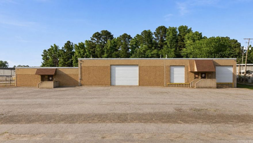 Opportunity to lease a versatile ±12,350 SF industrial warehouse on 1.81 acres in Jacksonville, AR. Built in 1981, this single-tenant facility features 1,350 SF of office space and 11,000 SF of warehouse space, an 18' clear ceiling height, 4 external dock-high doors (2 with rail access), 2 drive-in doors, & a fully fenced parking & storage yard — ideal for manufacturing, distribution, or storage operations. Exceptionally well-positioned for logistics, with direct access to Hwy 57 and convenient connectivity to I-440, I-40, I-530, & I-30. On-site Union Pacific rail access connects operators to UP's expansive national network, opening freight lanes across the country for efficient inbound and outbound shipping. Additional multimodal advantages include close proximity to the Port of Little Rock, providing river freight access via the Arkansas River. Situated in the Jacksonville/Sherwood industrial corridor, the property is also adjacent to LR Air Force Base, making it well-suited for defense-related contractors & suppliers. A strategically located, functional asset offering unmatched transportation connectivity. Price is Monthly Base Rent/sliding scale/5+ yr lease. See Agent Remarks.