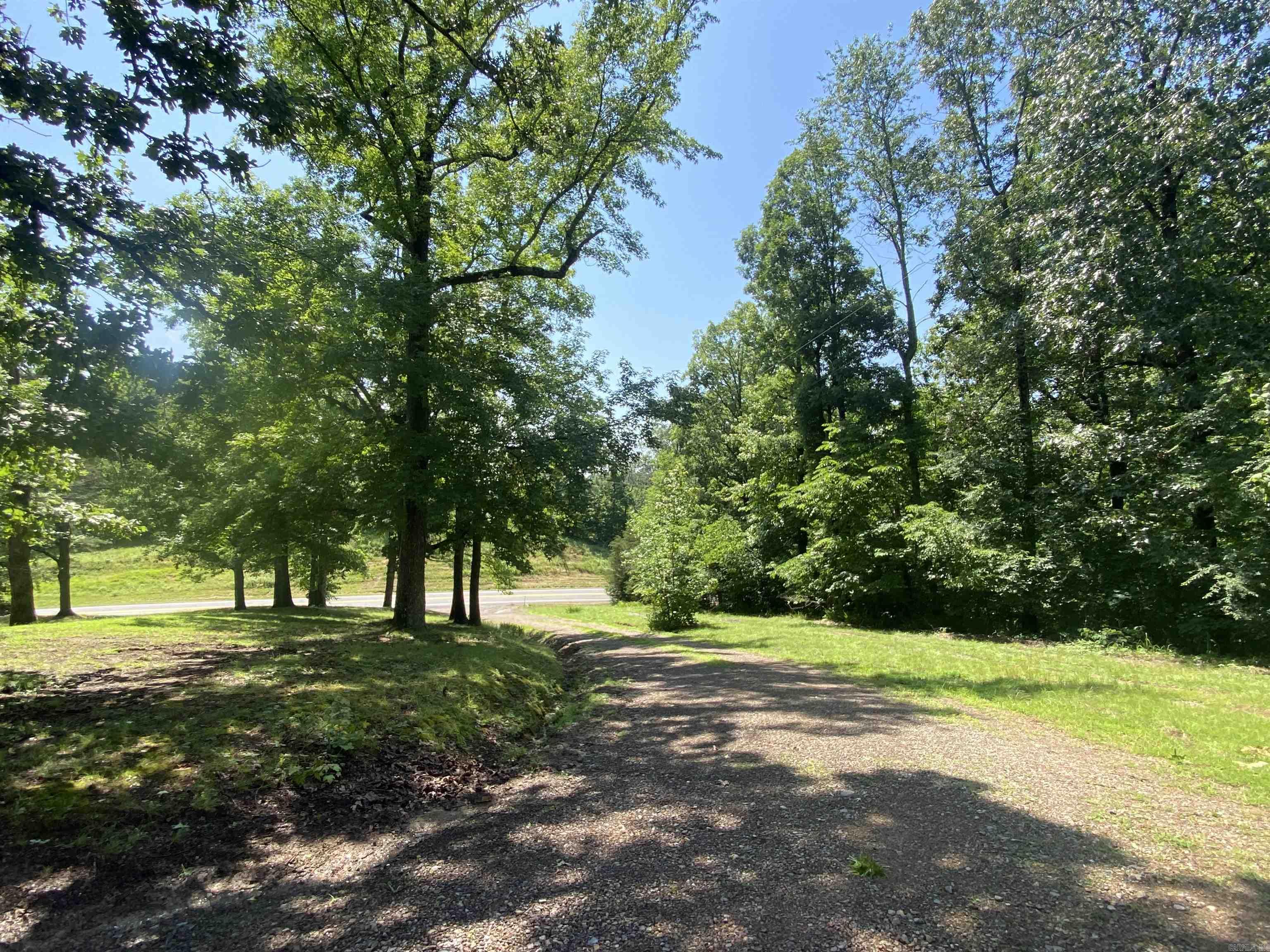 Acreage! This 2.5 acre parcel m/l is ready for you to build or put a mobile home. There was previously a mobile home on site that burned, so all the utilities are in place for your new home. City water, septic, and electric on site. Also, this property features a storm shelter on those stormy summer days. Perfect for a hunting cabin as it borders the Ouachita National Forest, with hundreds of acres of pristine hunting grounds. Call today! $72,000.00