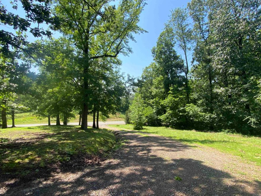 Acreage!  This 2.5 acre parcel m/l is ready for you to build or put a mobile home.  There was previously a mobile home on site that burned, so all the utilities are in place for your new home. City water, septic, and electric on site. Also, this property features a storm shelter on those stormy summer days. Perfect for a hunting cabin as it borders the Ouachita National Forest, with hundreds of acres of pristine hunting grounds. Call today!  $72,000.00