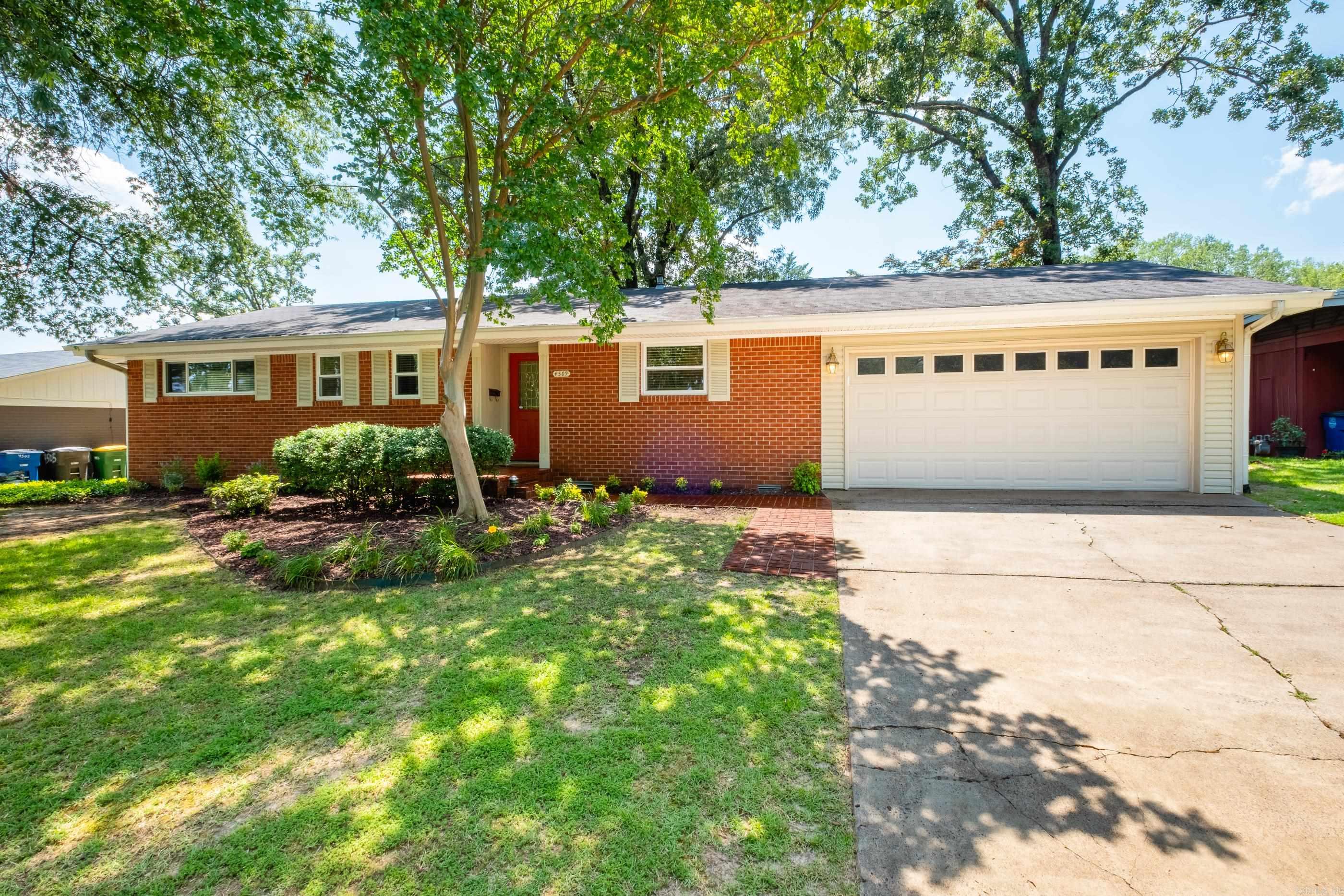 Charming mid-century home in desirable Lakewood location. Generous counter and cabinet space in the kitchen, fireplace with gas logs in formal living room, and tons of built-in shelves & natural light in den/2nd living room. Newly remodeled (2025) bonus space features separate mini-split HVAC system and could be 4th bedroom, office or game room. Beautiful, original hardwoods in 3 bedrooms, hall & formal living room. Custom, floor-to-ceiling windows & sliding glass door in corner of den leads onto deck, which overlooks the private, fully fenced backyard with stone walkway & extra landscaping. Amazing location within walking distance of Old Mill, Lakewood Lakes 2 & 3 and Lakewood Elementary. Other recent updates include new vinyl windows (2022), new tile in dining area (2022), recessed lighting (2021) and interior paint (2021). Two-car garage with storage room.