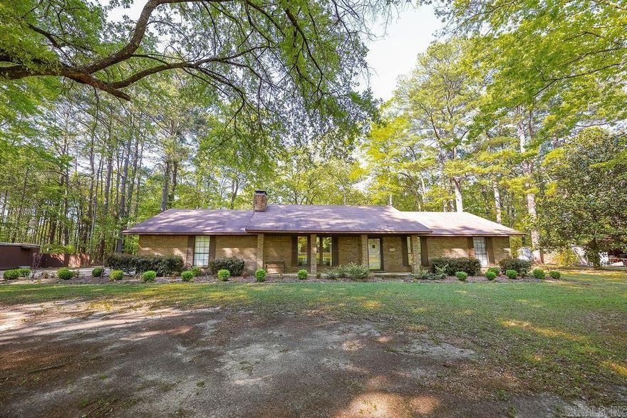 Welcome to this meticulously maintained 3-bedroom, 2-bath home nestled on a spacious 6.78-acre lot in Calion, Arkansas. Located just 1.9 miles from Calion Lake and Ouachita River access, this property offers the perfect balance of peaceful country living and outdoor adventure.  Inside, you’ll find beautifully updated bathrooms and a refreshed master suite designed for comfort and relaxation. The home also features a spacious laundry room, ideal for extra storage and convenience.  Step outside to enjoy the covered patio—perfect for entertaining or simply taking in the serene surroundings. A storage building and additional covered parking add even more function to this already well-appointed property.  Don’t miss the opportunity to own this charming slice of Arkansas!