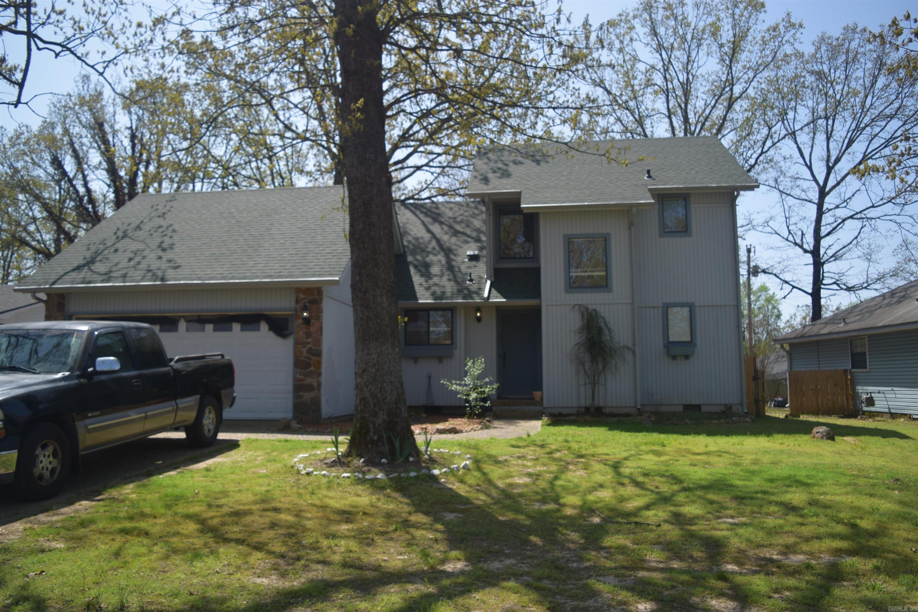 Price improvement on this two story home is drenched in natural light and has an open concept floor plan. Ideal centrally located culdesac neighborhood Great updates with flooring, painting and newer kitchen appliance. This 3 bedroom 2 bath home boasts 1547 square feet of heated and cooled space, a fantastic cathedral ceiling living room with a lovely stone wood burning fireplace. Great size landing upstairs would be a great study or crafting nook. Seperate laundry room, two car garage with plenty of storage. Finished attic space off one of the bedrooms upstairs for great storage. Spacious privacy fenced backyard with a nice size brick patio perfect for grilling and chilling and plenty of room for the fuzzy or two legged kids to play. Ideally located in a quiet culdesac neighborhood close to shopping and freeway. Call for your private tour today. See agent remarks for list of updates.