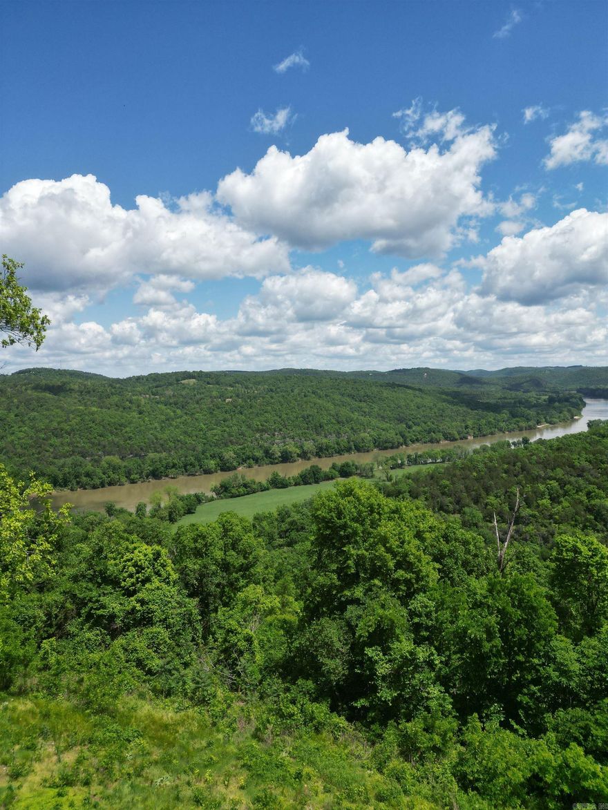 Discover a rare opportunity to own 5 breathtaking acres in the heart of Mountain View, Arkansas. Perched above the scenic White River, this property boasts panoramic views and the peaceful seclusion you’ve been searching for. Perfect for building a dream home, weekend getaway, or vacation rental, the land features gently rolling terrain, mature trees, and easy access to fishing, kayaking, and outdoor recreation. Just minutes from the vibrant music and arts scene of downtown Mountain View, you'll enjoy the best of both worlds—tranquility and convenience. Whether you're looking to invest, build, or escape, this parcel offers endless possibilities. With views this stunning and a location this desirable, opportunities like this don’t last long. Come experience the beauty, charm, and potential of this one-of-a-kind property today.