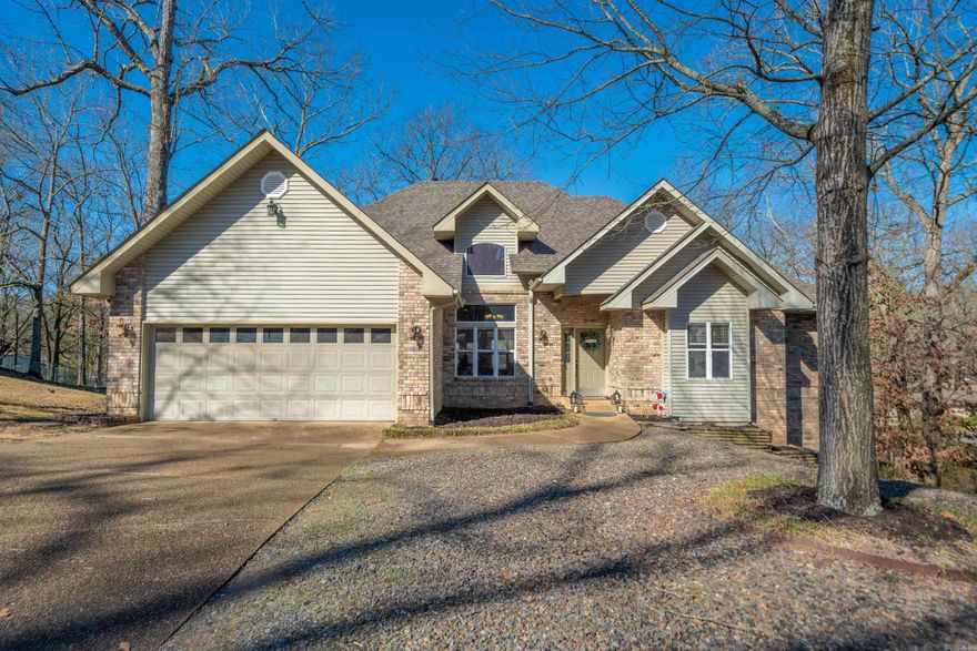 Welcome to this beautifully maintained home in the heart of Hot Springs, where modern updates meet comfortable living. This spacious residence offers 2,659 square feet of thoughtfully designed living space, featuring 3 BR's & 2 full BA's. Step inside to discover a home that's been lovingly updated w/an eye for both style & functionality. The fresh paint throughout creates a clean, contemporary canvas for your personal touch. The welcoming living room is anchored by an elegant fireplace with a 2018 custom mantel, perfect for cozy gatherings on cool Arkansas evenings. Recent upgrades ensure worry-free living for years to come. The brand-new heating and cooling system (2024) provides optimal comfort year-round, while the new water heater (2024) guarantees reliable hot water. The 2023 cookstove makes meal preparation a joy, & the 2021 roof installation offers peace of mind. The home's central location puts you minutes away from daily conveniences, including grocery shopping at nearby market. Families will appreciate the proximity to Lakeside schools, making morning routines smoother & after-school activities easily accessible. Don't miss this great opportunity!