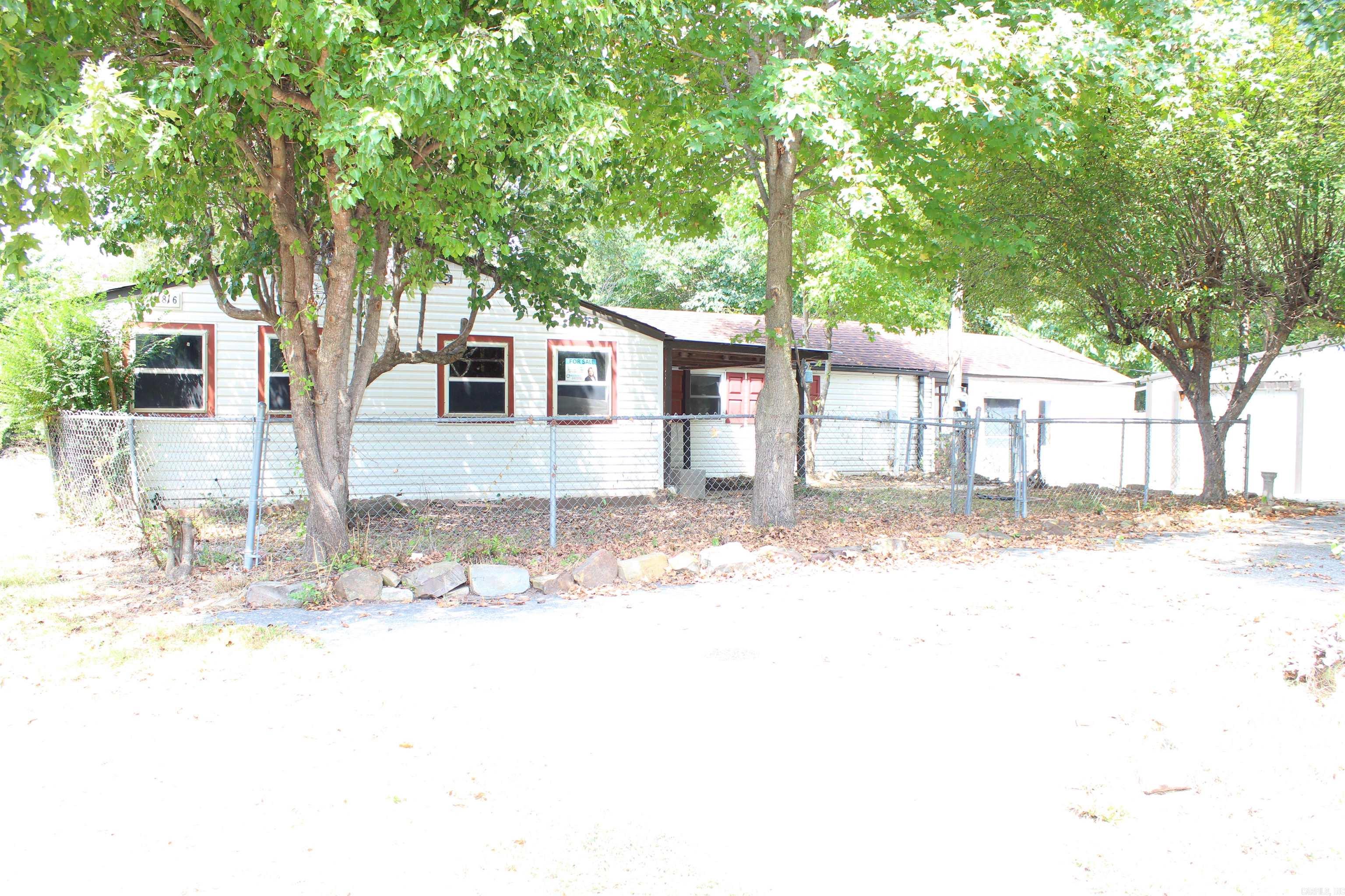 This charming two-bedroom, one-bathroom home sits on a generous .97-acre property, offering plenty of space and privacy. The significant lot size provides numerous possibilities for outdoor activities and future expansion. The property includes a detached garage, providing convenient vehicle storage and additional space for tools, equipment, or hobbies. This separate structure adds both functionality and value to the home. The combination of the notable acreage and practical garage makes this property particularly appealing for those seeking room to spread out. Whether you're looking for space for gardening, recreation, or simply enjoying the tranquility of a larger lot, this home delivers on multiple fronts. The features and ample land create an excellent foundation for comfortable living.