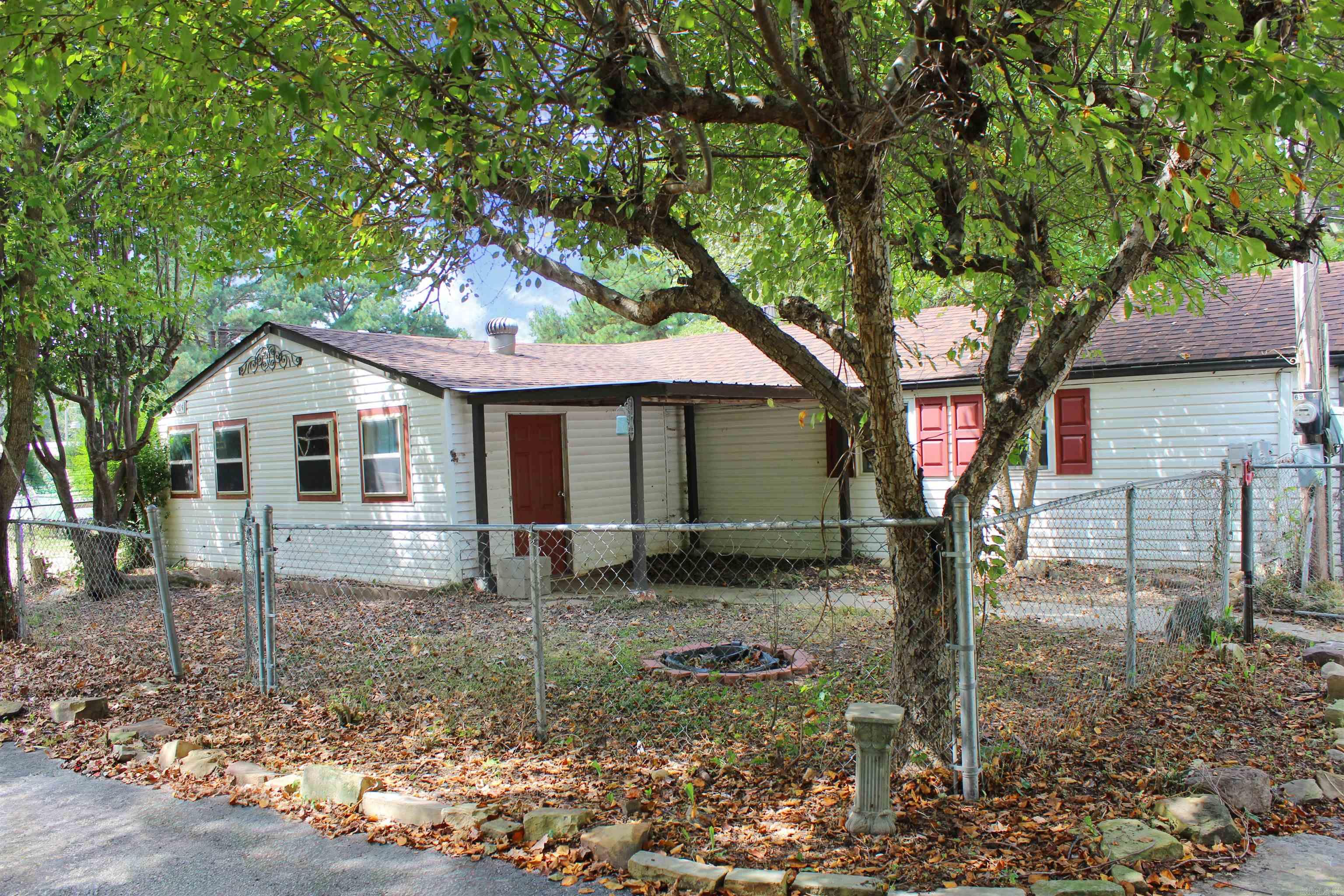 This charming two-bedroom, one-bathroom home sits on a generous .97-acre property, offering plenty of space and privacy. The significant lot size provides numerous possibilities for outdoor activities and future expansion. The property includes a detached garage, providing convenient vehicle storage and additional space for tools, equipment, or hobbies. This separate structure adds both functionality and value to the home. The combination of the notable acreage and practical garage makes this property particularly appealing for those seeking room to spread out. Whether you're looking for space for gardening, recreation, or simply enjoying the tranquility of a larger lot, this home delivers on multiple fronts. The features and ample land create an excellent foundation for comfortable living. **To help visualize this home’s floor plan and to highlight its potential, virtual furnishings may have been added to photos found in this listing.