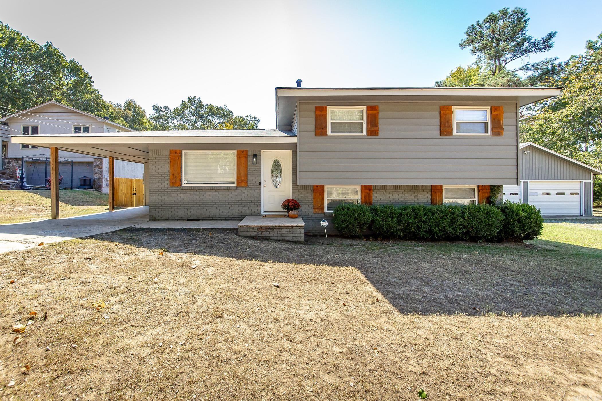 Welcome to this charming split level home located in the heart of Sherwood! This 3 bedroom, 1 and a half bathroom gem offers 1772 square feet of living space, nestled on a generous .84 acre lot within city limits. Step inside to find an open floor plan with the coziest living room! The kitchen features plenty of storage and counter space. The top floor boasts three bedrooms, providing ample space for the whole family. On the bottom floor you'll find a secondary living space that is perfect for all of your entertaining needs! Outside, enjoy the large yard ideal for outdoor activities and gatherings. Plus, the huge 30x50 shop is perfect for storage, hobbies, or whatever your heart desires. Don't miss out on this fantastic opportunity to call Sherwood home! Schedule your showing today before it's gone. New roof 2024!