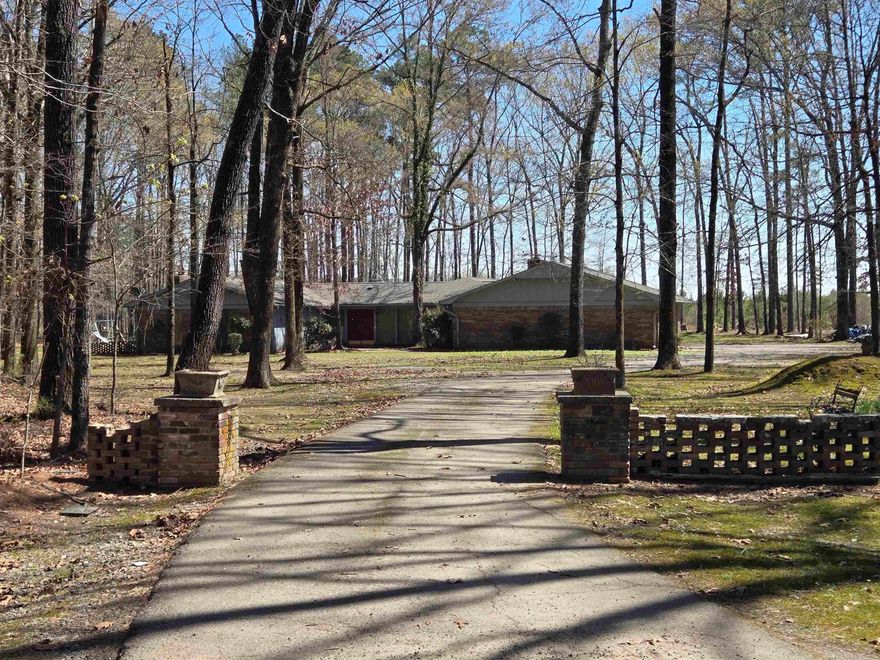 Private 8-acre retreat with no neighbors within 500 feet featuring 3,200 heated sq ft (3,900 under roof). Flexible floor plan with 3 bedrooms plus office/optional 4th bedroom, 2 baths including wheelchair accessible, game room with bar, formal dining, and two wood-burning fireplaces. Recent updates include new roof (2025), new HVAC system (2025), and two new water heaters(2025). Outdoor features include a 16x36 in-ground pool, concrete patios, gazebo, a 15x30 split-storage shed and another metal carport all with peaceful surroundings. *Home shown by appointment only, 24 hours notice required. Lender pre-approval/proof of funds required prior to showing. **Agents please see agent remarks**