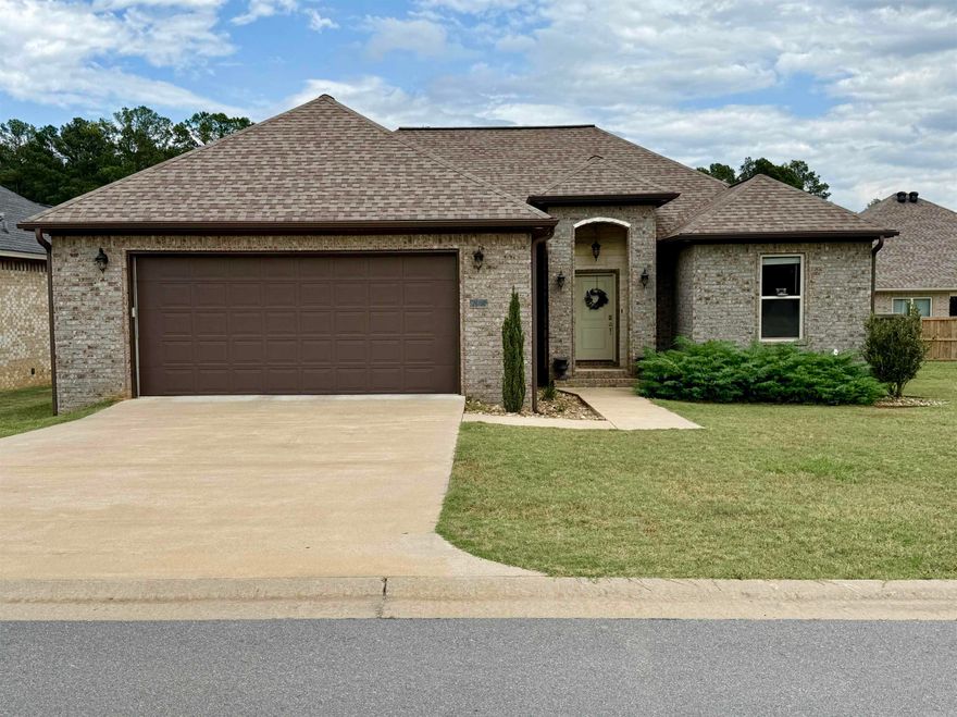 Welcome to 6 Sayde Lane in the beautiful gated community of Legacy Pointe Subdivision. This charming 4 bedroom, 2 bath home has an open kitchen/ living concept with vaulted ceilings. Wonderful craftsmanship in the details of this home.  Master bedroom is large with his/her walk-in closets. Master bath is luxurious with a soaker tub, tiled walk in shower, double vanity, and separate water closet. Luxury vinyl plank throughout the house.  Large kitchen with walk in pantry and lots of counter space, with a breakfast bar.  Nice laundry room with cubbies as you come in from the spacious two car garage. Enjoy sitting outside on the covered back porch with the privacy of the wooden fence in the backyard.  Pretty landscaping invites you to the front door. Schedule a tour of this home today.