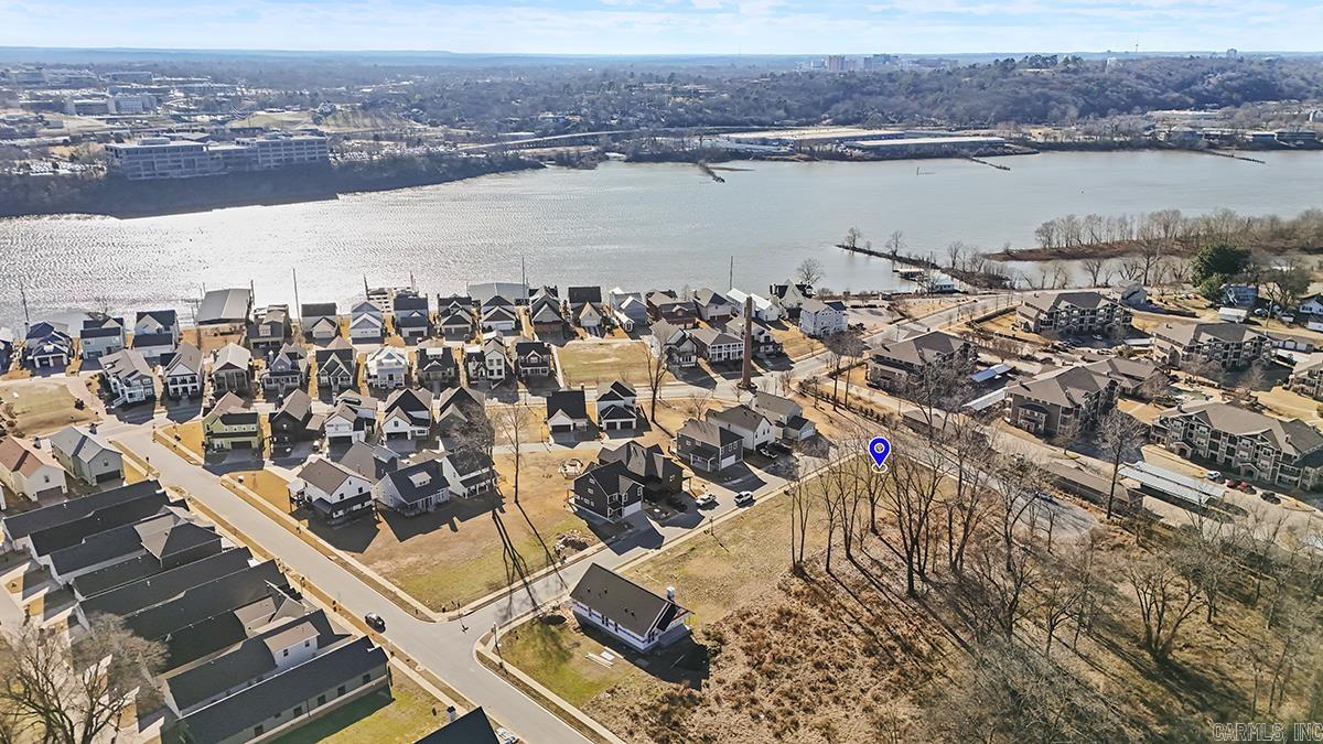 Ready to build your dream home..... This stunning lot in the desirable Rockwater neighborhood of North Little Rock offers the perfect blend of convenience and natural beauty!!! Just steps from the scenic River Trail, youāll enjoy easy access to outdoor activities along the Arkansas River. With downtown Little Rock and Dickey-Stephens Park only minutes away, youāll have an abundance of dining, entertainment, and recreational options at your doorstep. This is an ideal location to build your dream home in a vibrant, growing community!!