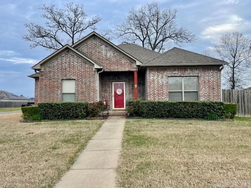 This home lives large. It has so many custom details. Custom cabinetry with under cabinet lighting, gas cookstove, corner sink with a view of the front yard, big pantry, granite countertops. The dining area has room for a large table. 9 foot ceilings give the house a spacious feeling. Primary bedroom is separate from the guest bedrooms. Primary bathroom has separate vanities, custom tile shower, and walk in closet. Big corner lot with 2 walk through gates and a double  gate. Nice large trees. Covered back porch. Door from the garage to the backyard as well. You won't want to miss this house.