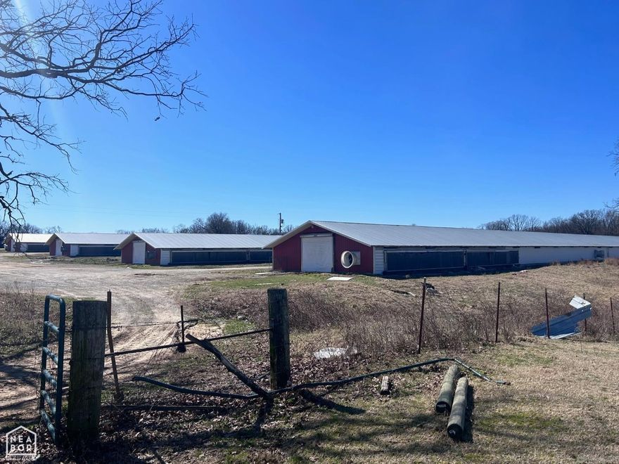 Imagine trading the daily grind for the rewarding lifestyle of this 62-acre poultry farm in Strawberry, Arkansas. You're not just buying land — you're investing in self-reliance and country living freedom. The operation centers around eight steel-framed 40x450 chicken houses built in 1996. Despite their age, they have been exceptionally well maintained and are in far better condition than you might expect. These houses truly need to be seen in person to appreciate their quality. Currently under contract with PECO, the farm generates immediate revenue with strong expansion potential on 62 acres, including a scenic pond ideal for livestock or recreation. Living quarters include two occupied manufactured homes and one traditional home ready for renovation. A grant is already in place for spray foam insulation on four houses and a new stacking shed. Nestled among woods and open pastures, this property offers the perfect rural lifestyle and legacy you’ve been dreaming of.