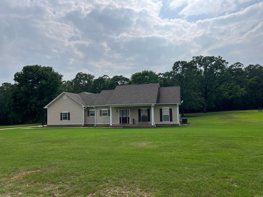 Welcome to a little piece of country with this amazing home located on 1.3 acres. Home features open floor plan with spacious living area with beautiful laminate floors. Kitchen has an abundance of cabinetry with stainless steel appliances only 4 years old. Split floor plan with generous space in bedrooms. Large master suite, double vanities, shower and separate soaking tub. Laundry room. Half bath. Garage has a under garage storm shelter. Outside you will find fenced yard with 12X18 shop. HVAC unit replace Spring, 2023. Roof only 4 years old. Water heater 3 years old. Home is well-cared for and ready for a new owner. This one won't last long, call today for your tour of this property. SEE AGENT REMARKS!