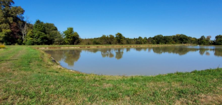 129+- Acres Fish/farming operation.  Has one pond in operation at this time.  Has a Rice base that is paying currently $8,000 - $10,000 per year payment.  Has at least three other ponds that could be in operation.  Ducks and Deer can be found on the property.  There is an old mobile home that is livable on the property and is currently occupied.  Could be an investment property with current owner operating as a fish farm.  Fish sheds/barn and old house do not convey without added price.  Minerals Convey.