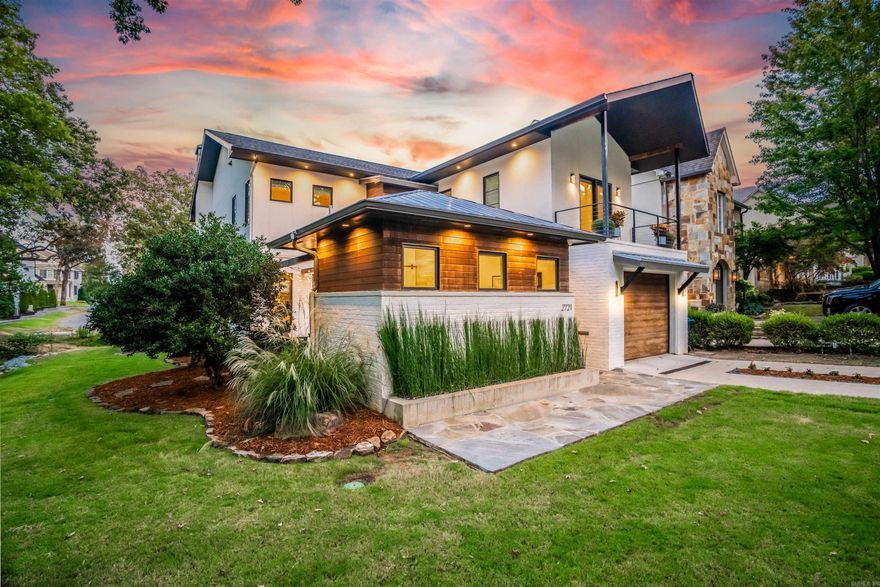 Discover your new sanctuary in this warm and contemporary home, where every detail exudes comfort and style. From the moment you step inside, you'll be captivated by the blend of modern amenities and timeless design elements. Exposed Brick and Antique Hand-Hewn Beams: The interior boasts exposed brick walls and antique hand-hewn beams, seamlessly merging the old-world charm with contemporary sophistication. Diverse Flooring: Walk across a captivating blend of concrete, tile, and wood floors that create an inviting atmosphere throughout the home. The heart of this home is the gourmet kitchen, featuring Carrera marble and stainless steel counters.  Enjoy the warmth and ambiance of a wood-burning fireplace both inside and outside on the covered patio. A spacious two-car tandem garage provides ample parking and storage space. In the age of the "new normal," a detached office space is a valuable addition, offering a quiet and productive work environment.This property is loaded with extra perks and upgrades that enhance your lifestyle. While there are too many to list, you'll be pleasantly surprised! 5th bed & 4th bath not included in total sf. Perfect office, in-law/guest suite!