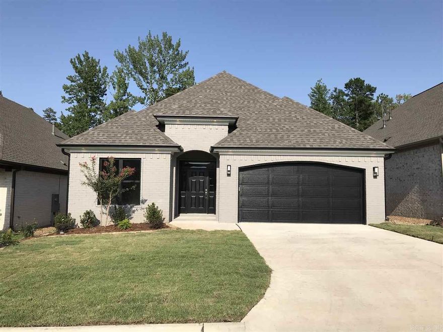 Beautiful home in WLR's Wildwood Place s/d - Close to Chenal Elementary,  Chenal Promenade & Kroger... Across the street from neighborhood park & pool... Bright open 1-level design... 11Ft Ceilings..  Kitchen w/Quartz island & custom cabinets... Custom walk-in shower in master bath w/multi-shower heads & soaking tub... Extra large walk-in closet... Hardwood floors thru out living areas.. Covered patio & fully fenced back yard...Home backs up to quiet green space. *Landlord is licensed AR real estate broker
