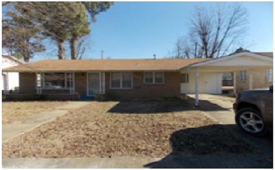 This house is located on a quiet little street and has mature shade trees with a storage building and partially fenced in backyard. Has a good size kitchen and living room. The exterior has a nice attached carport. Nice neutral paint throughout, along with carpet and vinyl throughout.  Good sized laundry room.  Property is sold "AS-IS" including any existing appliances, plumbing, heating and air conditioning and electrical system.