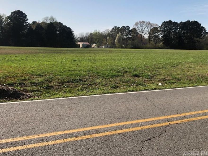 Discover a rare opportunity to own 8.26+/- acres of cleared, level land in the center of Searcy, Arkansas, ideally located along Skyline Drive. This property offers a blend of current income and future potential, featuring a small rental home that provides immediate cash flow while you plan your project. With its flat topography, survey already completed, and platted access on the west side from Julner Drive, the property is perfectly suited for residential development, multi-family housing, or custom estate homes. Its central location places you minutes from shopping, schools, medical facilities, and Beebe-Capps Expressway—making it one of the most convenient large parcels remaining in Searcy. Whether you’re a builder, investor, or developer, this acreage offers flexibility and long-term value in an area of steady growth and demand. Mineral rights will convey to the new buyer. Take advantage of this exceptional opportunity to shape one of Searcy’s next desirable neighborhoods or invest in premium land within city limits. Opportunities like this—size, location, and readiness—are increasingly rare. The 8.26+/- acres includes a 3 bed, 1 bath, 1,288 sq ft home used as a rental.