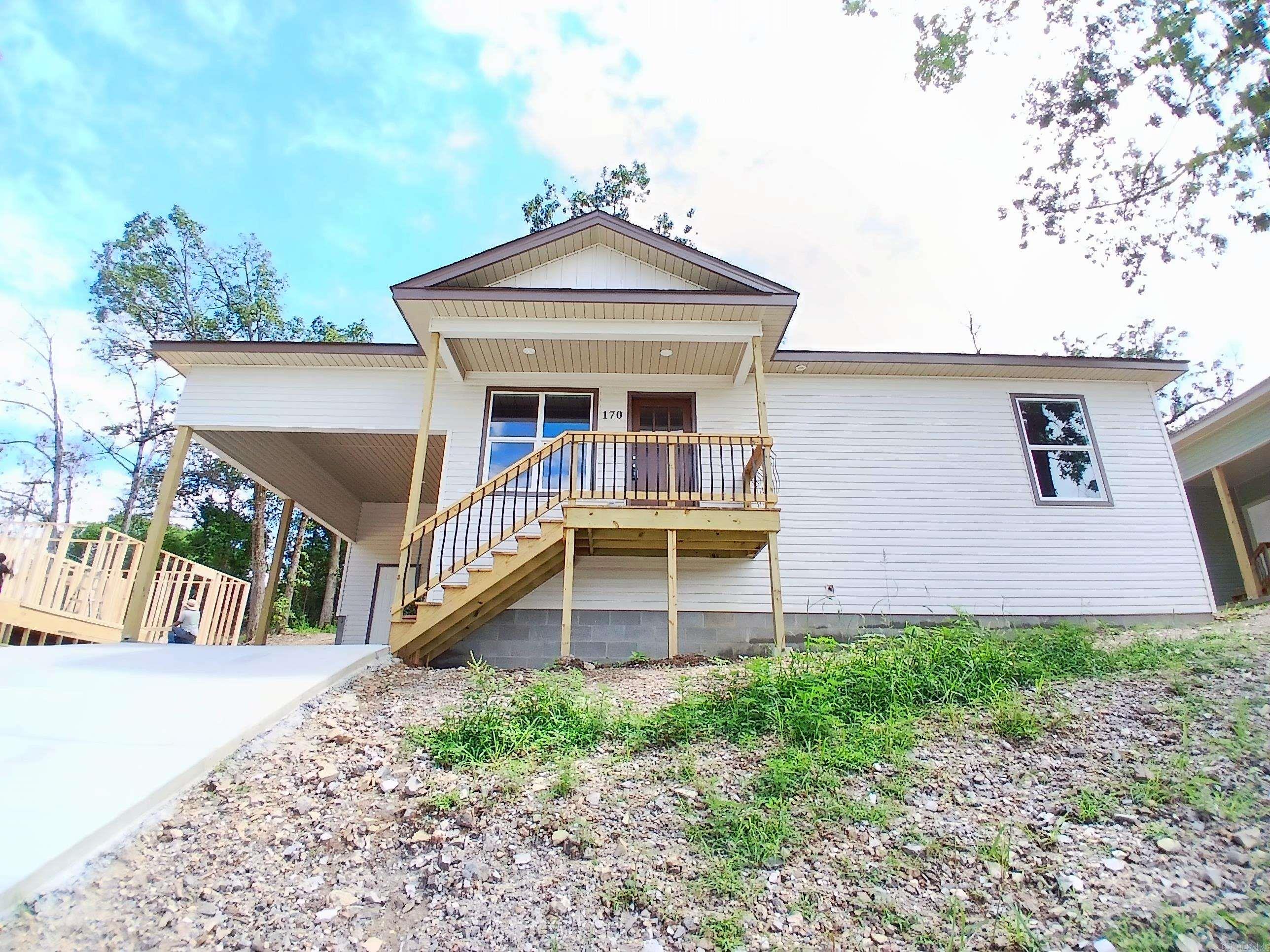 Exquisitely designed new construction 2bd 1ba home in heart of Hot Springs National Park. Attention to detail and craftsmanship awaits. This home boasts a feel of luxury with the comfort and coziness of a quaint home nestled in a developing but quiet neighborhood. Your home will be move in ready, no need to wonder about the quality. The new home smell will excite your sense of pride of ownership! Even tho in the heart of the city, there is still a rustic feel to the neighborhood with surrounding trees and scenery. Convenience, Quality and Coziness are all wrapped up in this gorgeous little house. Your New home awaits!
