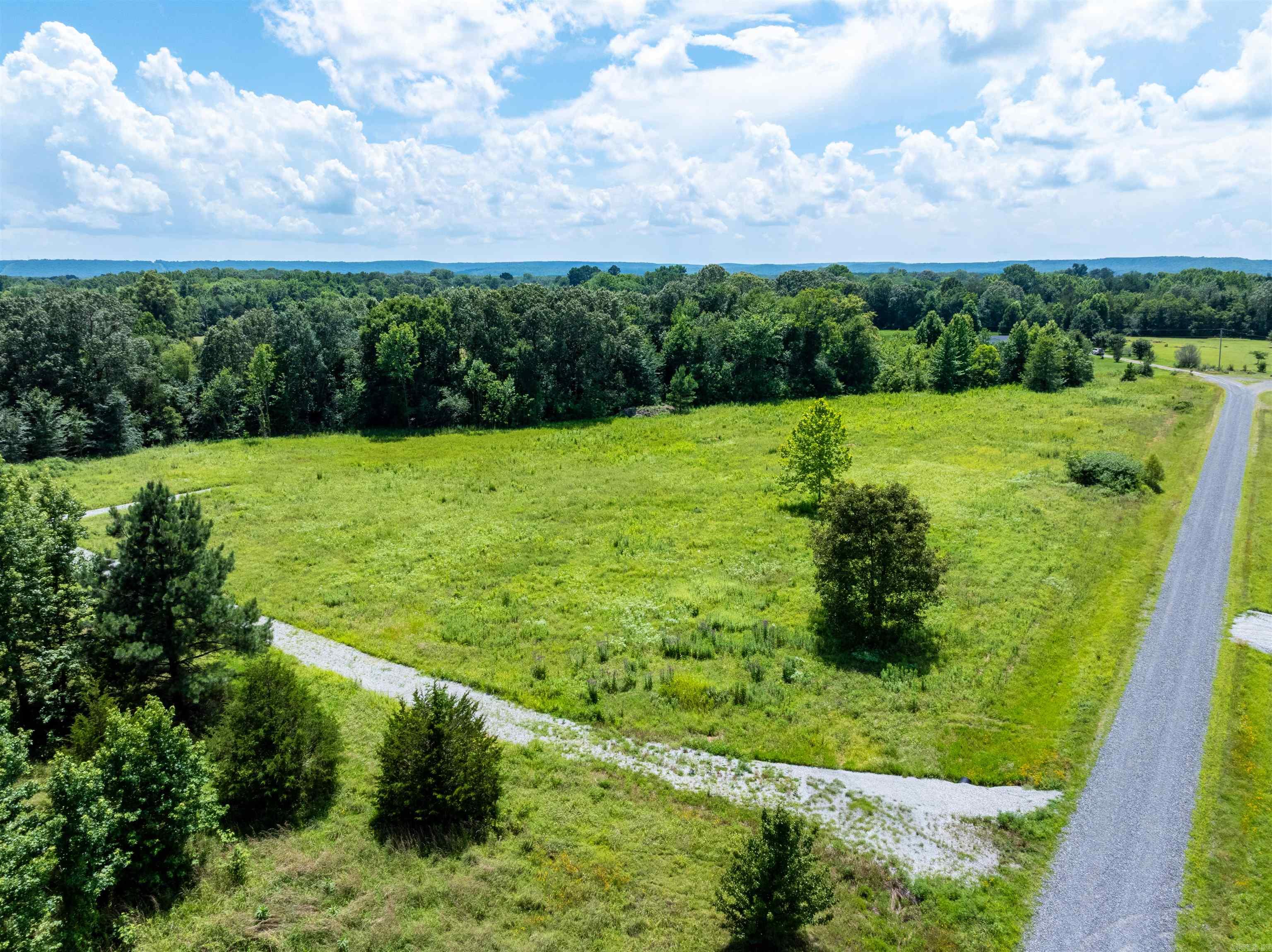 This 2.75 +/- acre lot is cleared, mostly level, and ready for your dream home. Located just 15 minutes from downtown Searcy, Arkansas, this property offers the peace and privacy of country living with the convenience of being close to town. A driveway has already been installed, and some utilities are available at the road. With plenty of space for a home, yard, and more, this property is the perfect place to create your ideal setup. Call today to schedule your showing.