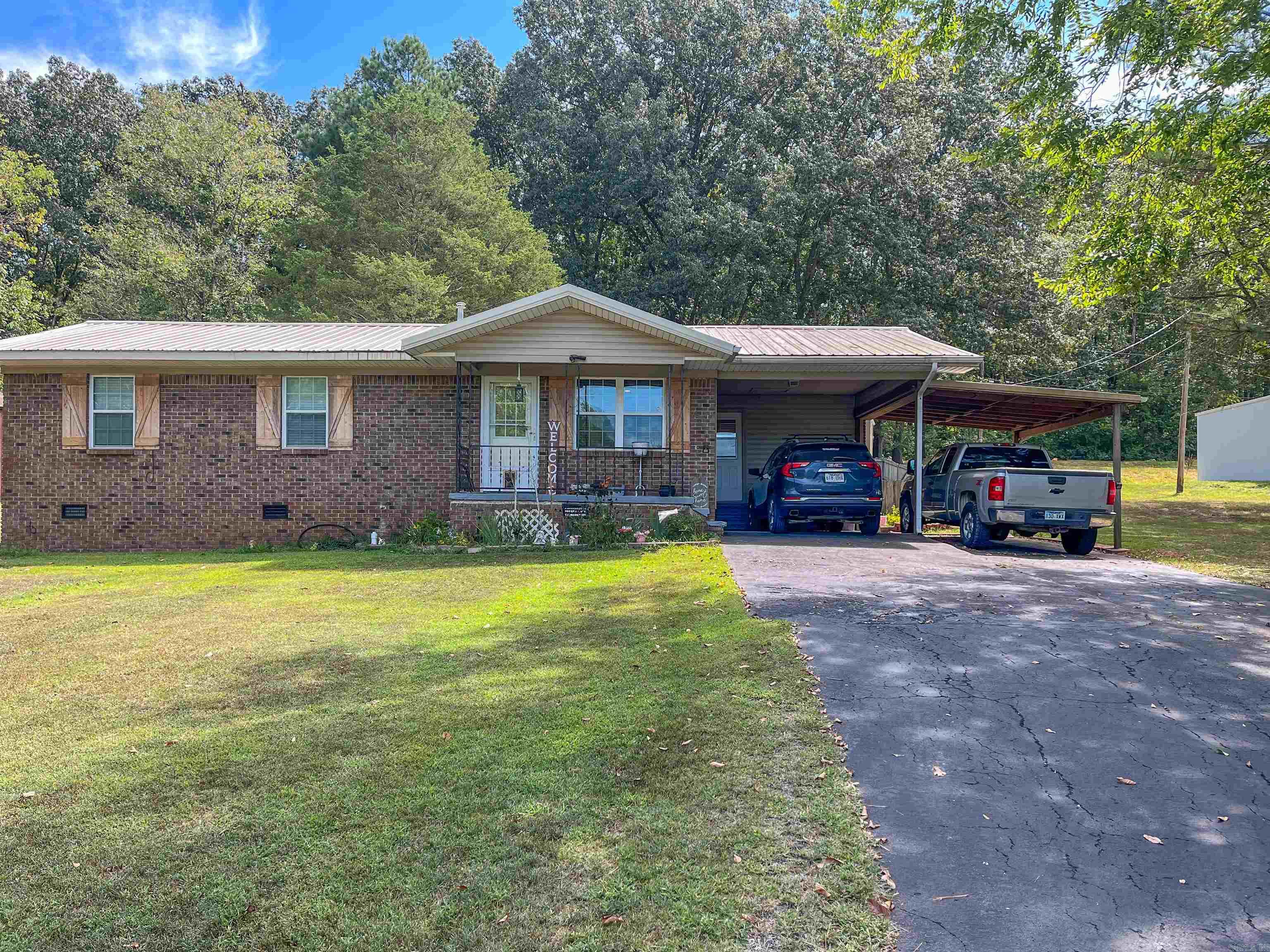 This gorgeous 3 bedroom, 2 bath home was completely remodeled in 2016 and is packed with upgrades. The kitchen boasts a granite sink with touch faucet, cold filtered water system with 6-stage reverse osmosis, Kenmore 1 HP garbage disposal, and new soft-close cabinetry, some featuring beveled glass doors. Marble backsplash complements the countertops, while a convection stove, microwave, and new side-by-side stainless refrigerator (to convey) complete the space. Throughout the home, youāll find Dupont laminate wood flooring, LED lighting, and Marazzi porcelain tile in the baths and laundry room. The Whirlpool Duet front-load washer and dryer will remain with the property. Modern systems include an automatic saltwater softener, tankless water heaters, and heated flooring in the main bathroom, while the second bathroom offers a custom walk-in tile shower. Outside, the property features two outbuildings, one with water and electric, plus a 30x30 heated and cooled shop built in 2022āideal for projects, hobbies, or storage. This home blends comfort, efficiency, and functionality in every detail.