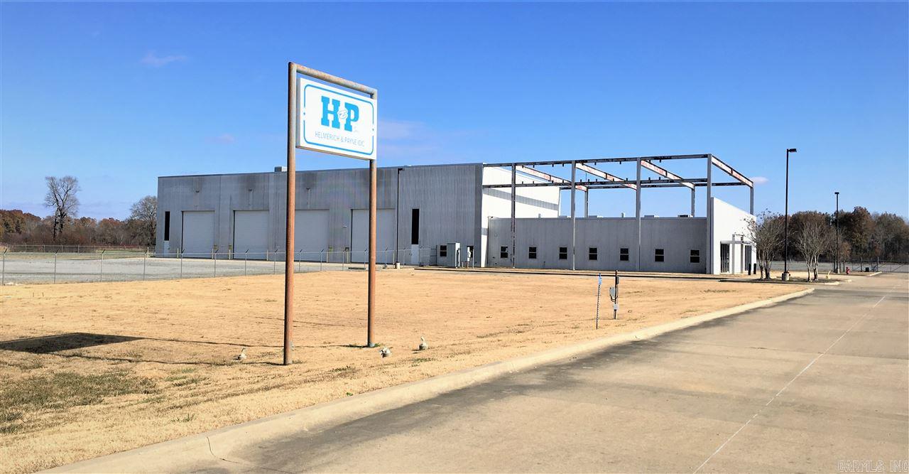 Total acreage available is 56 +/-. 3 tracts can be purchased all together or separately. The building has 15,162 Square Feet. The site has two gated entrances, Eight (8) grade level roll-up doors, stabilized gravel, curbed & paved driveways and parking areas.  The site is fully fenced with heavy power, automated gates, yard lighting throughout. One 20-ton overhead bridge crane, Two 5-ton jib cranes inside the shop.  AGENTS SEE CONFIDENTIAL REMARKS