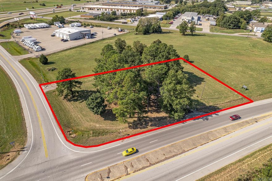 Recently Rezoned C-3. Vacant Corner lot on extremely busy South Jonesboro thoroughfare between East Nettleton Avenue and Interstate 555.