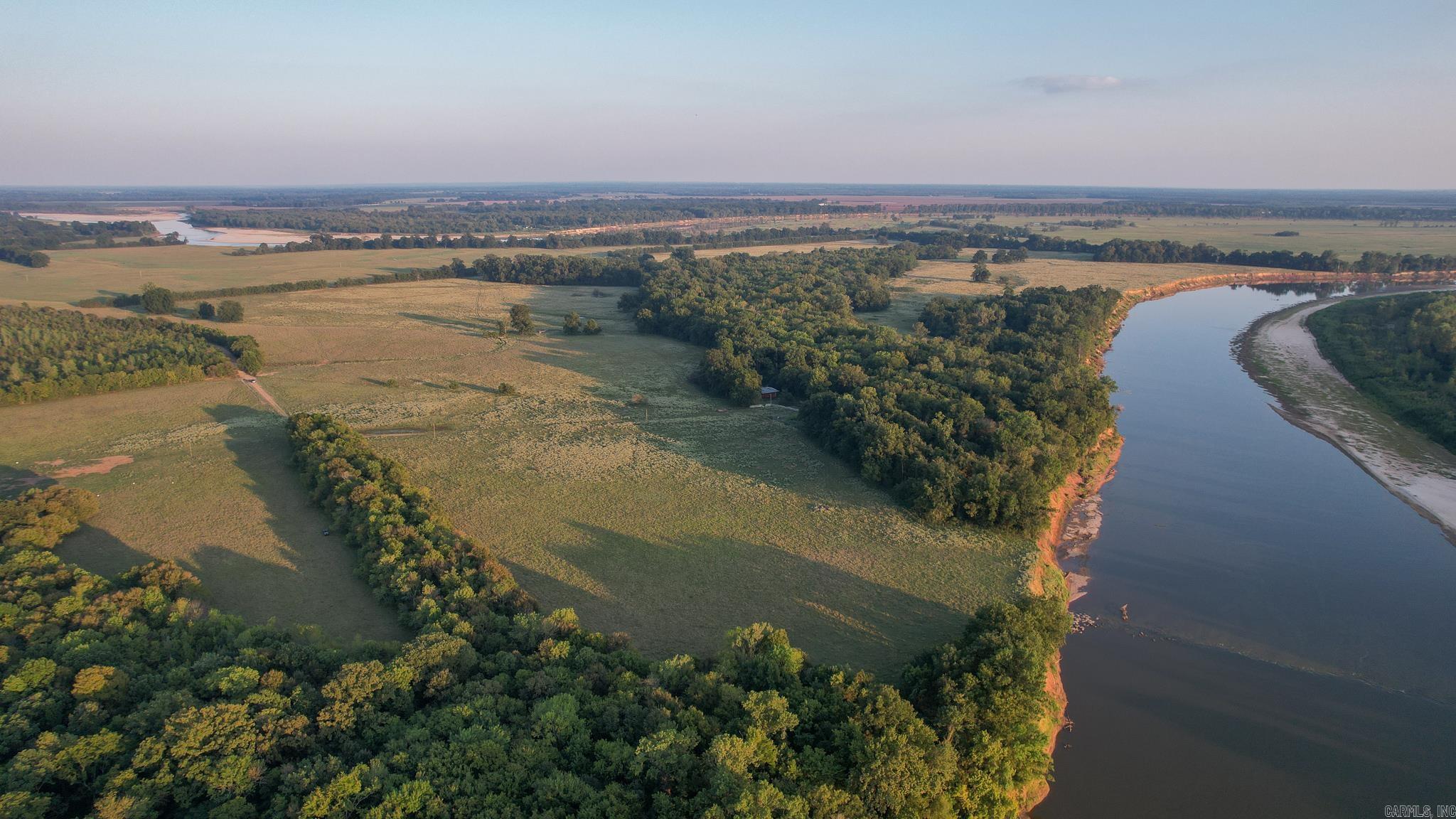 Great opportunity to own a cattle ranch with frontage on Red River. This property has been in the same family for many years and is a rare buying opportunity. The land has been primarily used for cattle and is completely fenced with a nice barn and a corral. The property also has a few wooded areas and a duck slough that offers some very good river-bottom hunting for ducks and deer. Red River frontage properties don’t come up for sale very often, call today!