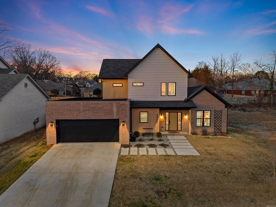 Custom-built by Sage & Stone Homes, this stunning 4-bedroom, 2.5-bath home showcases thoughtful design and elevated finishes throughout. The open-concept living area features a gas fireplace, custom recessed shelving, and a distinctive recessed ceiling detail that adds architectural interest. The kitchen is beautifully appointed with quartz countertops, stainless steel appliances, a pot filler, walk-in pantry with convenient “Costco door,” and custom cabinetry with curved edges for a soft, designer look. The spacious primary suite offers lime wash wall treatment on the walls and ceiling, a curbless entry walk-in shower, soaker tub, generous closet space, and custom closet doors for a refined touch. Additional highlights include a tankless water heater, pulley system drying rack in the laundry room, extra storage in the garage, and designer finishes in every space. There are truly too many details to list. Enjoy outdoor living on the covered back patio. A true custom home blending function, craftsmanship, and style. Perfectly located in one of West Conway’s most desirable neighborhoods, just steps from the scenic Tucker Creek walking trail. Agents see remarks.