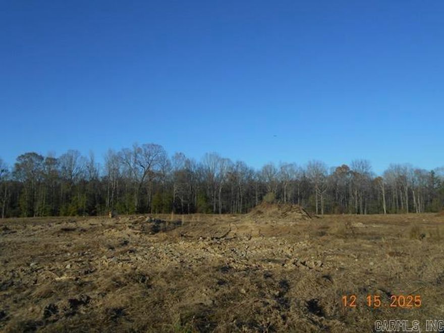 Property narrow but deep in layout. Wet weather creek toward back. Front half has been grubbed and ready for a house. Has been prelim perked (letter in documents) Restricted to houses with mininum square footage of 1000 sf. (deed restrictions in documents) Sardis Water available at road, Electricity at road, Windstream/Go Kinetic fiber internet  and gas is to the east and might be able to be extended....would need to contact Summit Utilities. No manufactured/mobile home that is five (5) years or older from the date on which it was manufactured will be allowed on any tract or parcel/lot.