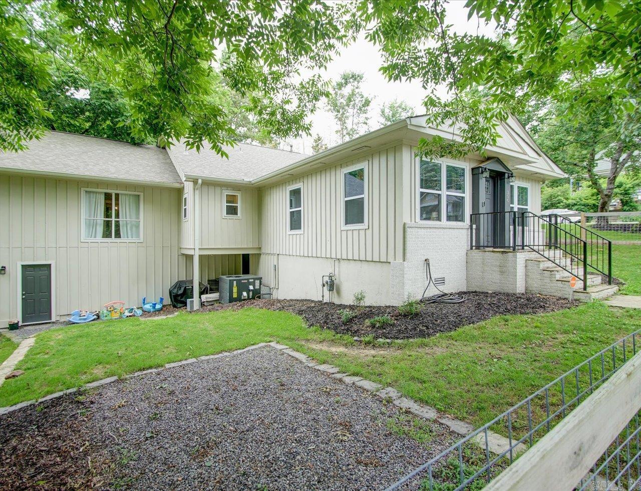 Historic Downtown Hot Springs! Enjoy this updated 3 bedrooms, 2 bath home. 2818 sqft with 2 car garage. Large corner lot. Completely redone is 2022 with new central heat and air, new roof, flooring, lighting custom kitchen cabinets. hot water heater, electrical and plumbing updates. Lots of open space to spread out and enjoy. Downstairs is unfinished blank canvas with separate water and electric.