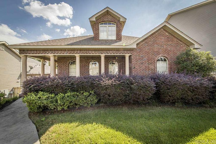 $50,000 Price Reduction!!  This beautiful home is positioned between Little Rock's upscale Woodlands Edge Subdivision and Brodie Creek Subdivision. This 4 Bedroom 3 full bathrooms. Master and guest bedroom on main level. Office, 2 bedrooms and bonus room upstairs. It has an open floor plan with hardwoods and fireplace. 2 Car rear entry garage that back up to green space and walking trail. Lives like a patio home. Tons of storage. Refrigerator to convey.