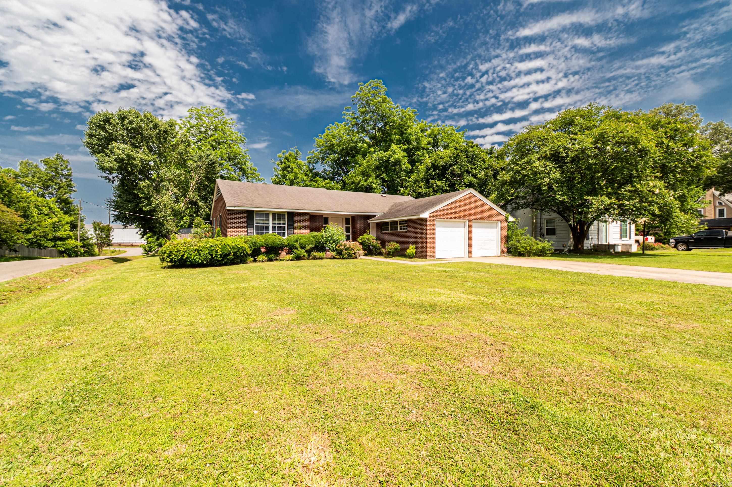 This classic 3-bedroom, 2.5-bathroom brick home full of potential and timeless charm. Nestled on a spacious corner lot in one of McGeheeās established neighborhoods, this property offers a solid foundation for your personal touch. Inside, youāll find generously sized rooms, a traditional layout, and original details that add character throughout the home.