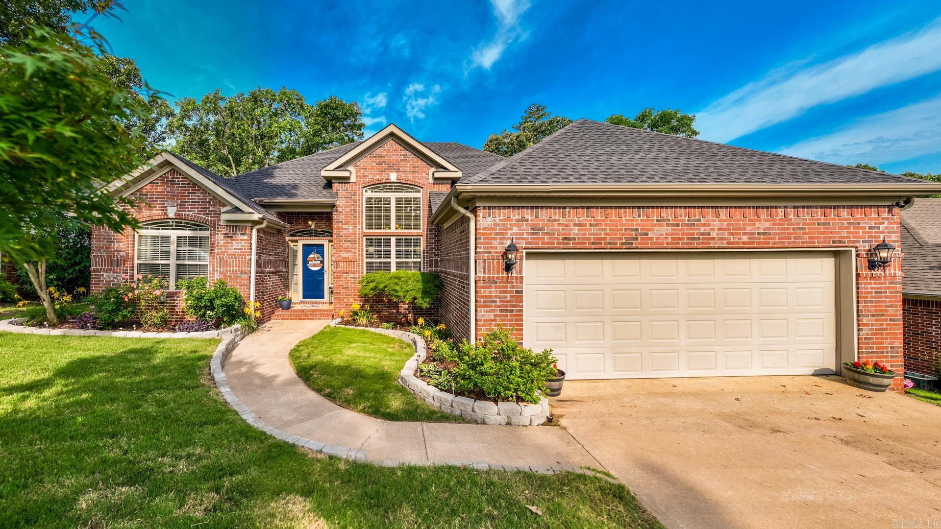 This newly landscaped all brick 3 bed/2 bath nestled up against the woods and surrounded by walking trails is the Maumelle Oasis you’ve been looking for. You’re welcomed into your spacious living area featuring a tray ceiling, gas log fireplace, and connected formal dining with a tall vaulted ceiling and soaring windows. This space could also easily be used as an office or reading nook. Your kitchen features solid surface countertops and stainless steel appliances with ample cabinet space. Your breakfast nook overlooks your private backyard and connected walking trails. On one side of your home are your two guest bedrooms with guest bath, while the other side features your large primary suite, also featuring its own tray ceiling, walk in closet, and primary bathroom with double vanity, walk in shower, and jetted tub. Don’t miss the new roof on this beauty. We can’t wait for you to come and see if it’s yours!