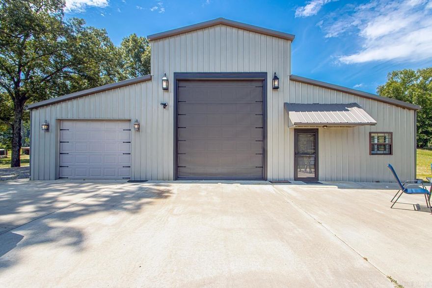 AMAZING UNIQUE HORSE PROPERTY ON 4 ACRES! Located in the heart of the East End Community and Sheridan School District! Owner built $36k, 1,900 square foot horse barn with 4 stalls, 2 large turn-outs, barn has water and electric.  House has spacious open floorplan with loft overlooking living area. Electric fireplace. Kitchen features granite countertops, stainless steel appliances and tons of storage. Additional living area w/ extra large roll-door plus additional garage. Tray ceilings and Master Bath with Jacuzzi Tub, walk-in shower, double sink and vanity. Heated/Cooled Workshop/bedroom.  Sale includes all appliances (inc. new Washer/Dryer) and 2 large mounted flat-screen TV’s.