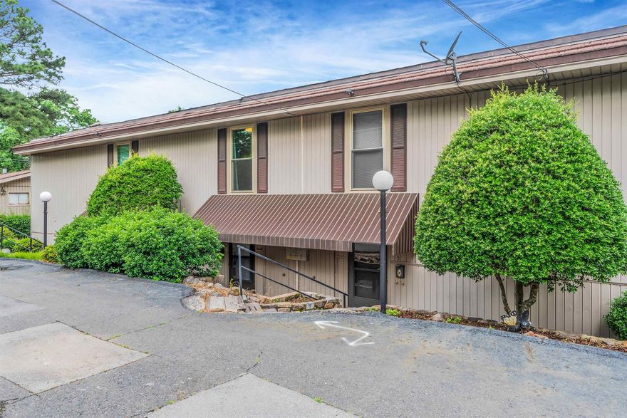 Furniture to convey with acceptable offer.   Lakefront Living on Lake Hamilton – Waterfront Condo with boat slip.  Wake up to the water and enjoy the best of lake life in this charming 2-bedroom, 1.5-bath condo right on Lake Hamilton in Hot Springs, AR. With 1,109 square feet of comfortable, low-maintenance space, it’s perfect as a full-time home or weekend retreat.  Inside, you’ll find a bright, open living area that flows into the kitchen and dining space—ideal for relaxing or hosting friends. Step outside to take in the lake view, unwind on the patio, or step down to the in-ground pool for a refreshing swim.  And the best part? A covered boat slip is included, so you can be on the water in minutes.  Convenient location near dining, shopping, and Oaklawn Racing Casino Resort.  Whether you’re spending the day on the lake or a night out at Oaklawn, this condo makes it easy to enjoy everything Hot Springs has to offer. Agents see Remarks*