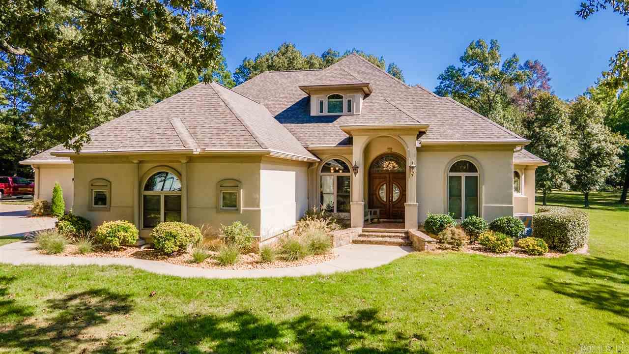 Magnificent estate on 8.28 peaceful acres w/pond.Gourmet kitchen flows into living room w/fireplace, inspired master w/luxurious bath & spacious walk-in closet.Two guest bedrooms are on the main level also. Upstairs could be the forth bedroom or media room w/craft room. Separated workshop (1200sqft) w/heating & cooling/half bath.Gorgeous landscape, stunning pool, beautiful woods, and new deck 2017.Take a swim in the pool or go fishing in the fully stocked pond. \It offers everything you need. Gated Privacy.