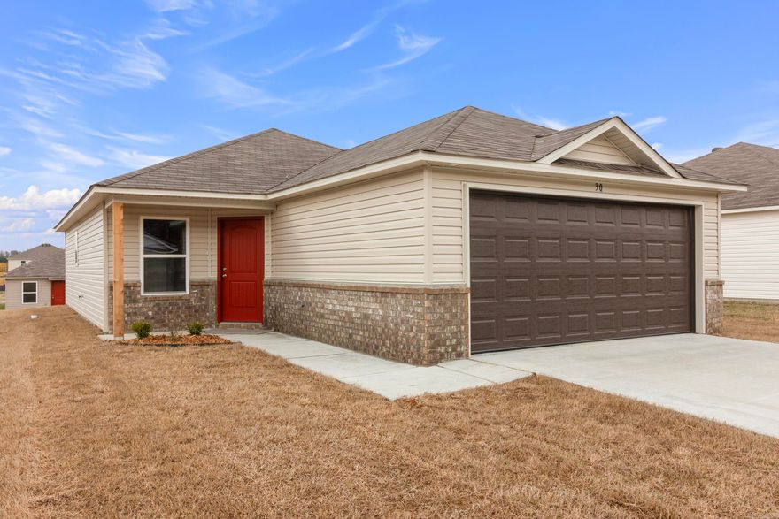 The Carlie II plan is a sweet home with a modern look. The clever offset door saves space and looks attractive. A hallway welcomes you in to a Living Room then Dining and Kitchen. Bedrooms 2 and 3 are set to the front of the home, and the Master Bedroom to the rear for added privacy.   Thoughtful upgrades included with this home:  plumbing faucet upgrade 2, door bell, crown on Kitchen cabinets, Luxury Vinyl Plank flooring in wet areas and Living Room and adjacent hallways, raised ceilings in Living Areas per municipal requirements, Cheyenne style interior doors, baseboards level 2, 25in wide attic stairs, LED disk lights in Kitchen, full sod, stainless steel appliance package.   THIS HOME IS SCHEDULED TO BE COMPLETE IN EARLY FEBRUARY.