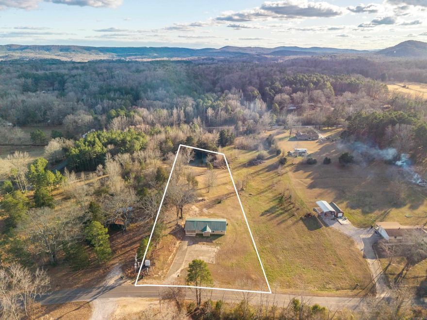 Welcome to 838 San Felipe in Hot Springs, a fully renovated home situated on 1.5 beautiful acres with a private pond, offering the perfect blend of modern finishes and peaceful country living. This property has been completely updated from top to bottom, with every surface new or professionally renovated, including all-new HVAC, appliances, and major systems for peace of mind. The kitchen features granite countertops, stainless steel appliances, and updated cabinetry, making it both stylish and functional. The bathrooms have also been beautifully upgraded with granite countertops, and the primary suite boasts a tiled walk-in shower, creating a spa-like retreat. Fresh flooring, fixtures, and finishes throughout highlight the quality of the renovation. Outside, enjoy the gorgeous acreage and pond, perfect for relaxing or entertaining, along with a storm shelter and storage shed for added convenience. This is a rare turnkey opportunity to own a fully updated home on scenic land just minutes from everything Hot Springs has to offer.