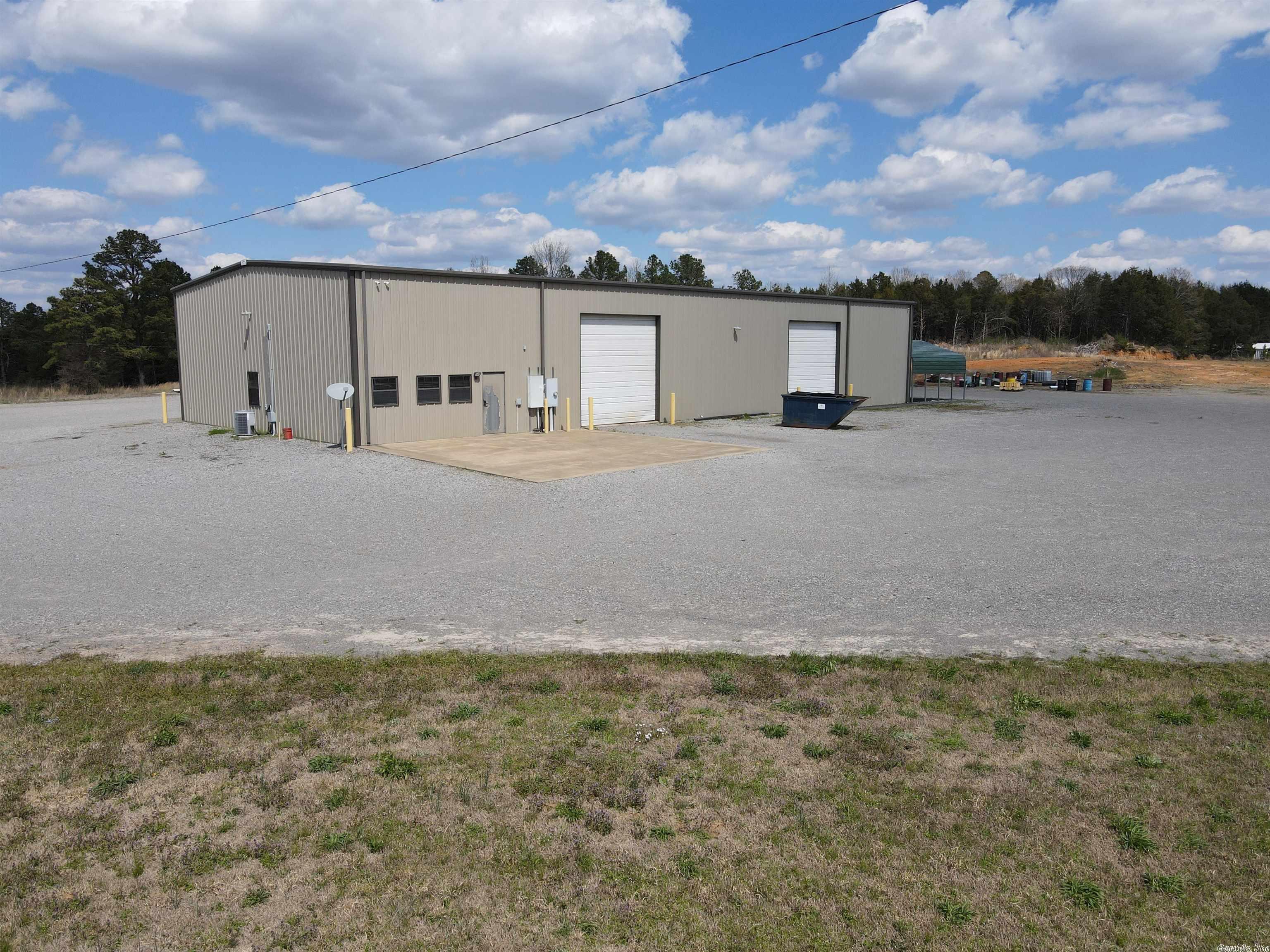 This is a deal, Shop/Office with 3.25ac with 2ac compacted yard, 5500sqft warehouse and 1750sqft office, 4 Large 14X14 bay Doors- 2 Large 14X16 Bay Doors Office has 2 offices down with kitchen, 2 restrooms and storage, Upstairs has large office and conference room. In the Warehouse there is 208 3-Phase power with 400amp breaker service.