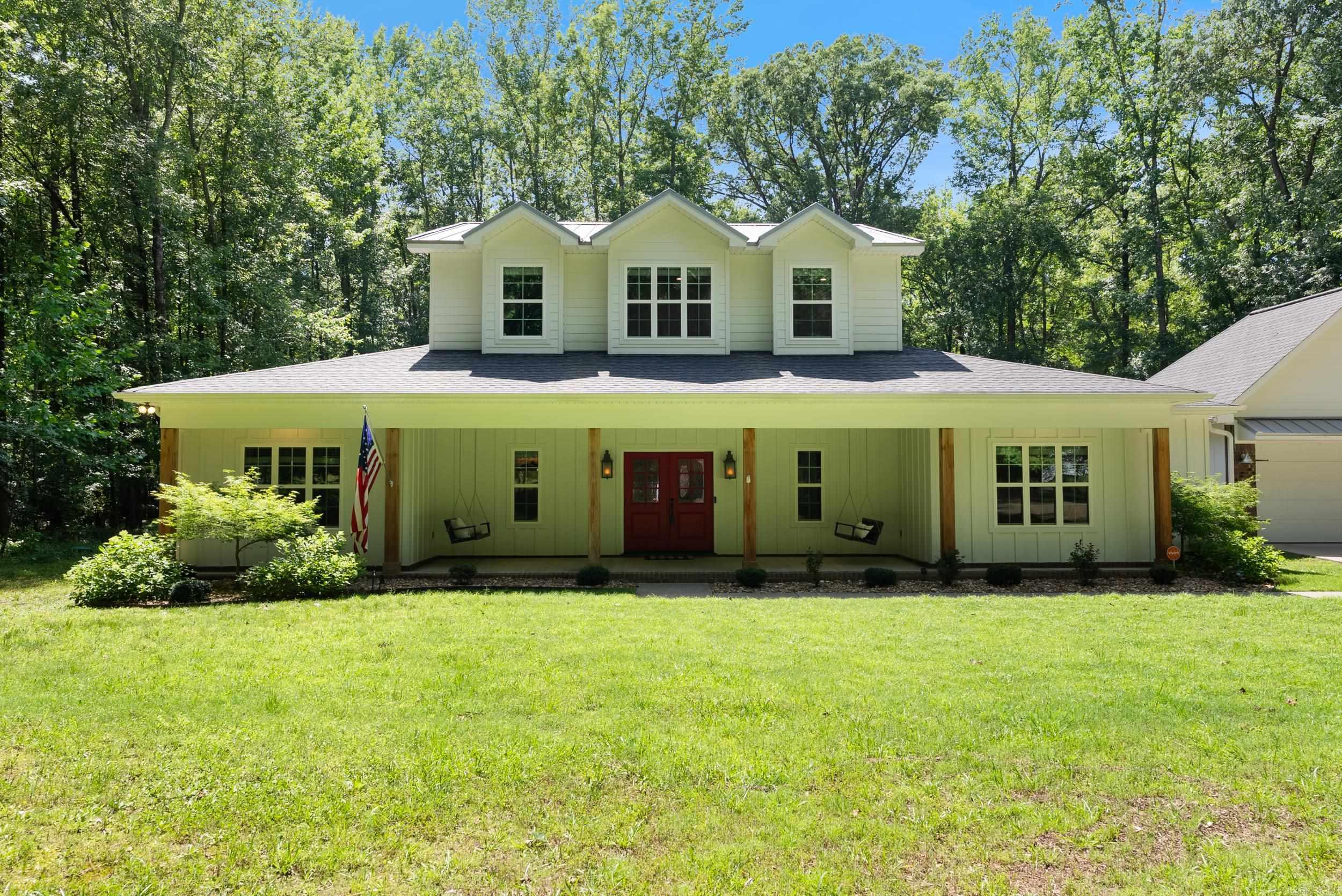 Opportunity of a lifetime to live the homestead life you've always wanted—The Robinson Farmhouse is for sale! Set on 7 peaceful acres, this custom-built farmhouse is more than a home—it’s a chance to plant your roots, and build a legacy. Whether you’re growing a garden, baking sourdough, or canning veggies, there’s room here to live how you’ve always dreamed. With 5 bedrooms, 3.5 bathrooms, a bonus room, a chicken coop, two porches complete with swings, and a storage building for your tools or feed—this place is built for the self-sufficient lifestyle. The heart of the home is the open kitchen, dining, and living space—perfect for big family dinners or cozy nights in. You’ll find granite countertops, stainless appliances, updated lighting, a coffee bar, and a walk-in pantry with space for every baking staple and canning jar. The primary suite offers a true retreat with a clawfoot tub, fully tiled walk-in shower, and plenty of space to unwind after a long day. Fresh wall paint and brand-new carpet give this home a clean, cozy feel throughout.This isn’t just a house—it’s the lifestyle you’ve been waiting for. Come take a look and fall in love!!