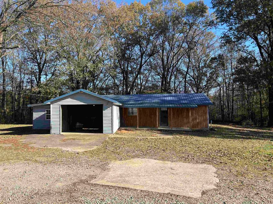 Discover the charm of country living with this delightful all-electric home situated on nearly 4 acres just outside the city limits of Bradford. This property boasts a 20x20 shop with 2 10x20 lean tos, which is perfect for projects or storage and a storm cellar for peace of mind. It also offers a clubhouse with electricity - ideal for hobbies or a kids' retreat and a functional well for a backup water source (Jackson County water). This home features a large laundry area and a renovated kitchen and bathroom. Hot water heater was replaced in 2024. Metal roof is approx. 8 years old. HVAC- 14 years old. 2 separate deeds. No current survey available. Sq. ftage appox. Please measure. Schedule your showing for this adorable home today!