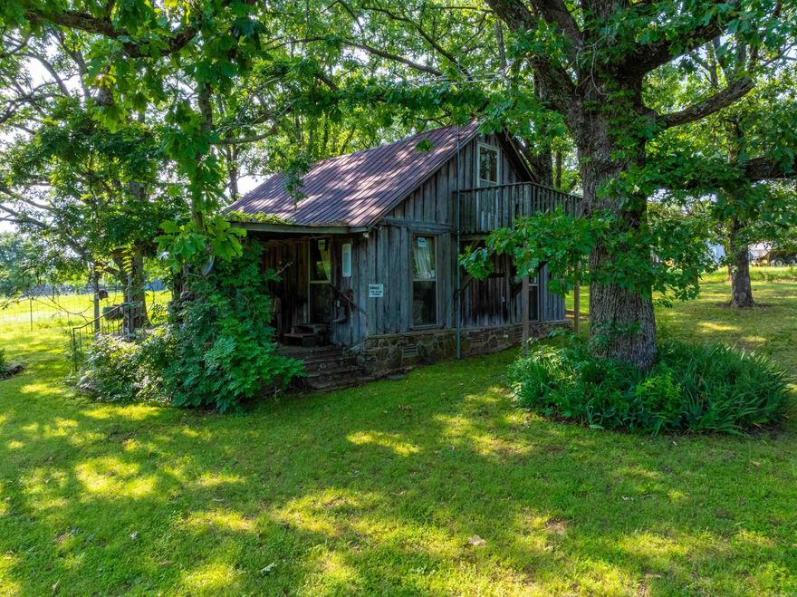 320 Acres +/- • Ranch & Recreational Paradise • Jackson County, AR  Just 1/4 of a mile on gravel. This 320-acre retreat offers the perfect mix of pasture, woods, and water—ideal for ranching, hunting, or even a stunning wedding venue.  The gated entrance opens to lush fields, hay meadows, and mature shade trees. A large barn features horse stalls, a lean-to for equipment, and a fully equipped upstairs living space with a bedroom, full bath, living room, and game room. Perfect for entertaining or overnight stays!  Rustic cabin sits under tall trees, with a cozy loft, multiple beds, and a charming front porch.  Full kitchen, wood burning cookstove, laundry, full bathroom and central Heat/Air.  The land is roughly half pasture and half woods, cross-fenced, with 4 ponds and a working coral. Great hay production and excellent habitat for deer, turkey, and even the occasional bear.  Location is key—just 1/4 mile off the highway, 20 minutes to Newport, a few miles to the interstate, and 65 miles to Little Rock. The White River is just a short drive away.  Whether you're dreaming of a working ranch, recreational escape, or investment property, this one checks every box.