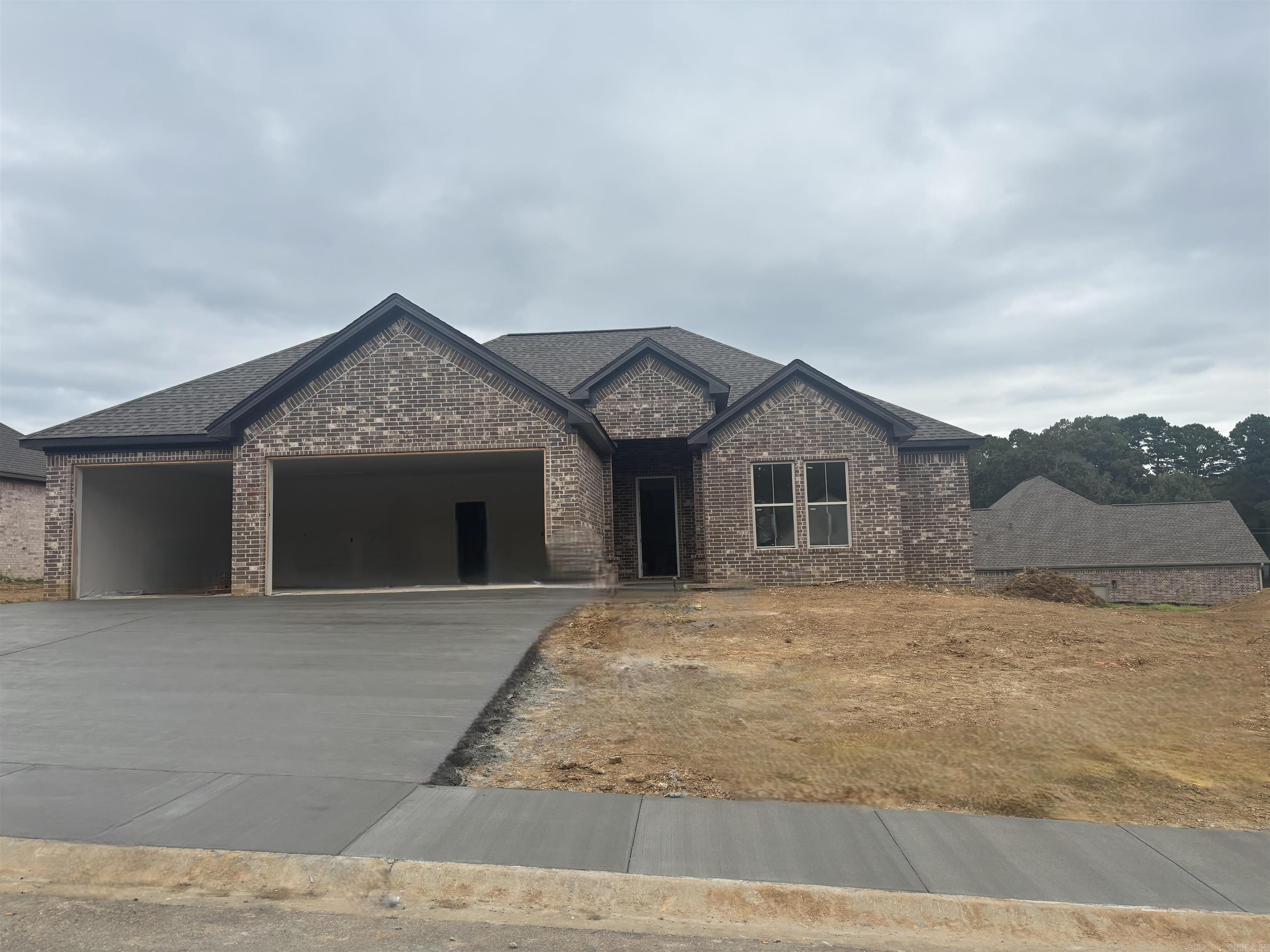THREE CAR GARAGE!!! Large covered back porch, extra landscaping. LVP flooring , custom cabinets with large island, wall oven, gas cooktop. butler pantry, also regular pantry. Primary has tile shower with separate tub, large closet.