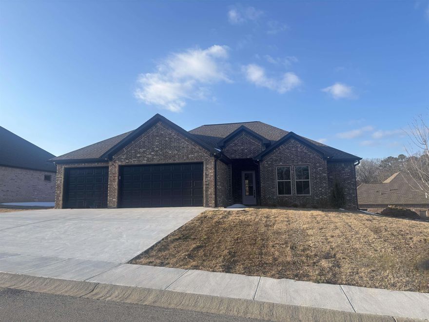 THREE CAR GARAGE!!! Large covered back porch, extra landscaping. LVP flooring , custom cabinets with large island, wall oven, gas cooktop. butler pantry, also regular pantry. Primary has tile shower with separate tub, large closet.